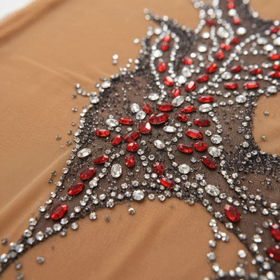 Close-up of figure skating dress fabric with stretch and sparkle